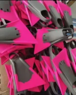 Bulk stock factory photo hot pink grey bicolor dolphin shape silicone swim flippers wholesale snorkel training fins stacked inventory