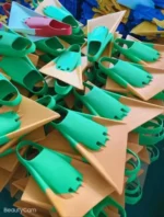 Warehouse bulk stock lime green tan two tone dolphin design silicone swim fins factory wholesale supplier inventory photo