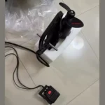 Unpacked finished Yak Outdoors kayak underwater thruster motor with digital LCD speed controller foam packaging floor display real product shot