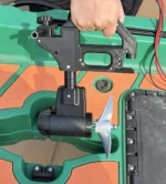 Hand installing 12V 800W brushless trolling motor on fishing kayak deck
