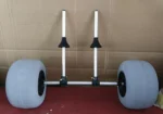 Real product photo of 12 inch sand balloon wheel beach kayak trolley on indoor test floor