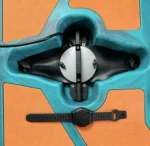 Top view of kayak motor mounting bracket installed in hull with wireless watch remote controller