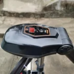 Top-down closeup of P300 electric trolling motor control handle and speed adjustment panel